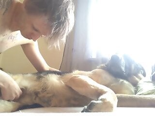Curious young man wants to feel the dog's penis in his mouth